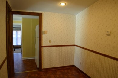 Nice dining room just off of the kitchen. Vinyl fl