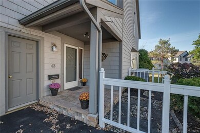 Covered porch over front entry.  Door on the left 