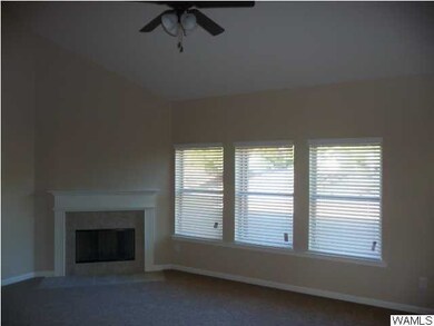 Large Family Room with Fireplace and Vaulted Ceili