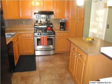 Fully equipped kitchen with some stainless applian