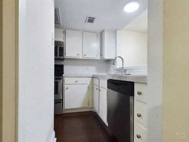 Kitchen with stainless steel appliances, light co