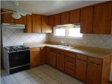 Newer kitchen cabinets; window at sink!