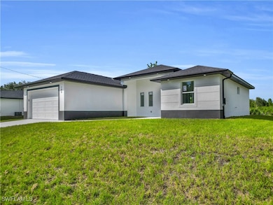 100 W 11th St, Lehigh Acres, FL 33972 - photo 2