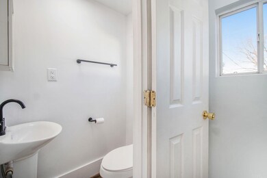 Convenient Half Bath With Vinyl Flooring And Fresh