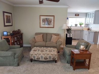 This area is a great space for dining or a work area or use the formal dining room instead.