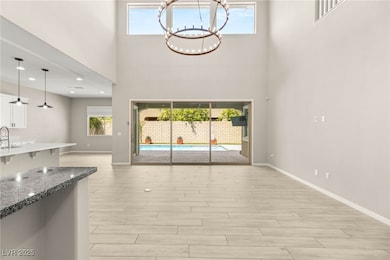 built in bar attached to living room, vaulted ceil