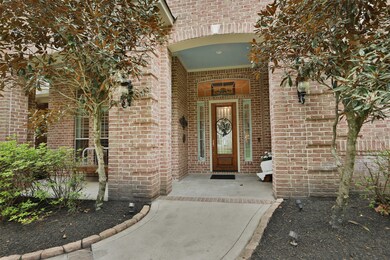 Welcome your guests under the covered porch with room for your outdoor furniture!