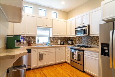 Spacious kitchen with stainless steel appliances