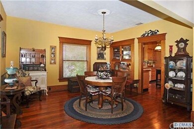 Huge formal dining room with original built-in chi