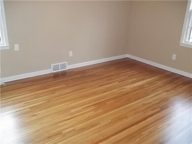 Master bedroom with fresh paint & hardwood floorin