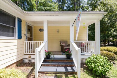 Doorway to property featuring a porch