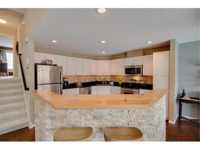 This  kitchen is a chef's dream with a breakfast b