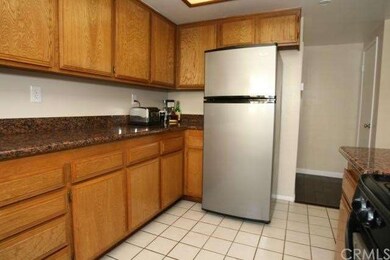 Lots of cabinets for storage and long counters. Gr