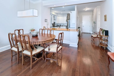 Beautiful walnut peninsula with built-ins has over