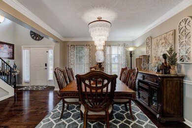 Dining space with a textured ceiling, a healthy am