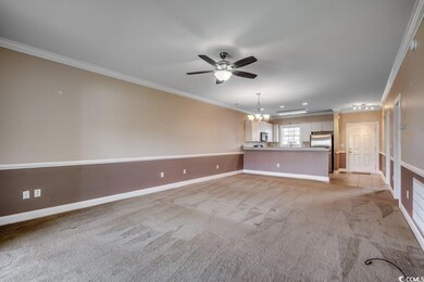 Unfurnished living room with ceiling fan with nota