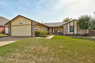 Mid-century inspired home with concrete driveway, 