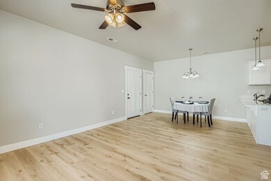 Semi-formal dining area with new wood laminate flooring