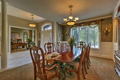 View into the formal dining room, entryway and int