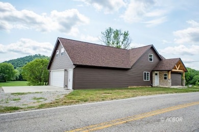 New 2 car garage, concrete parking pad