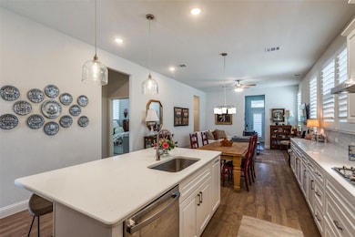 Island kitchen with upgraded pendant lights