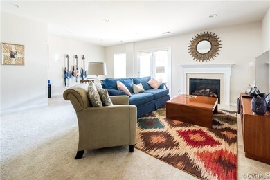 Lower  level recreation room, with gas logs in fir