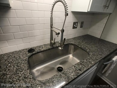 Sink w/commercial faucet