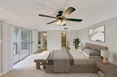 Primary Suite on second floor with private balcony
