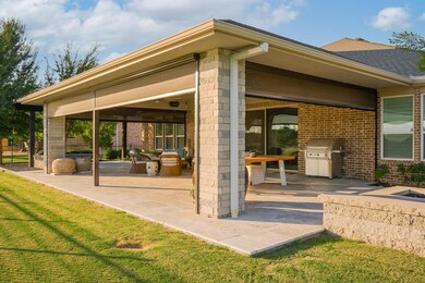Patio Outfitted with Convenient Retractable Sun Sc