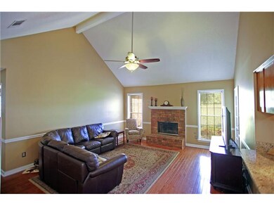 Charming and Cozy Family Room offers Hardwoods,  G