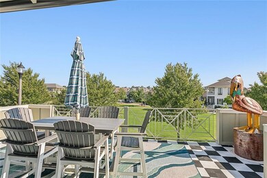 Balcony seating with custom, outdoor kitchen and g