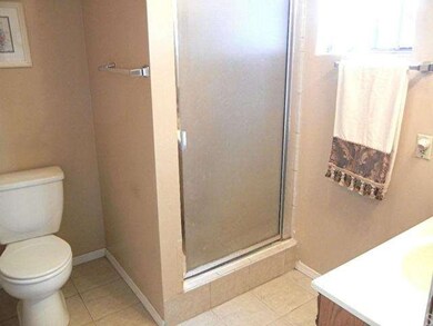 Beautiful decorator colors are in the main bathroo