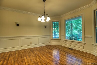 Elegant formal dining room with shadowbox detailin