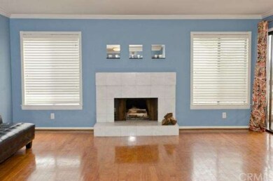 Wood burning fireplace in the spacious living room