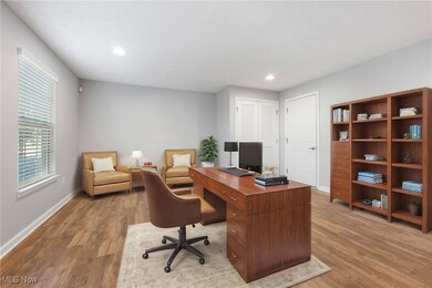  *Virtually Staged Office space featuring light wood-type flooring