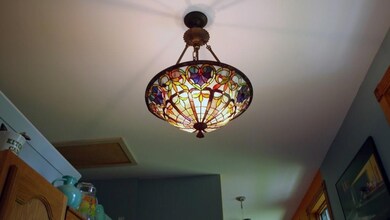 Cottage #1 kitchen chandelier stays!