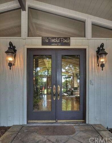 Inviting glass front door....Look directly through the door to the beautiful rear yard