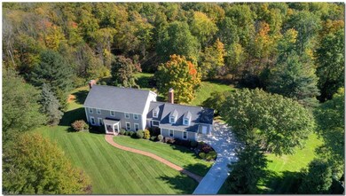 Ultimate privacy on a coveted cul-de-sac.