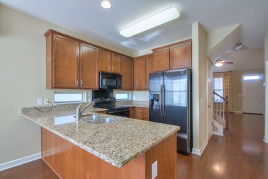 Granite counters and plenty of cabinet space.