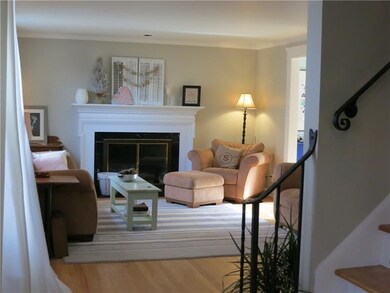 This large living room has a working gas fireplace