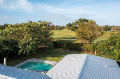 View of swimming pool featuring a lawn