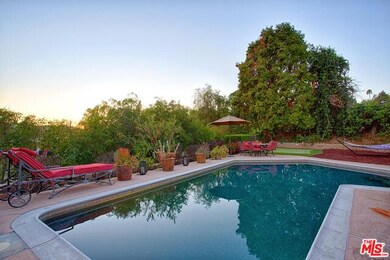 Backyard pool with mountain views