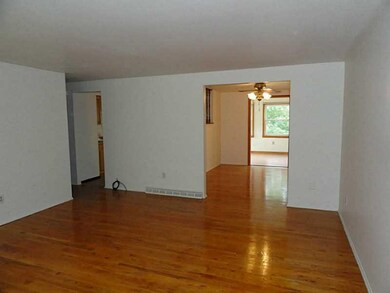 Living Room. The living room leads to the dining r