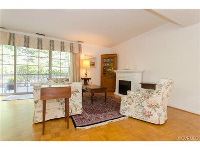 A cozy seating area is created at one end of the l