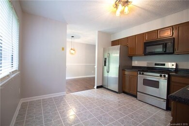 The kitchen and dining area! (Updated fixtures and flooring)