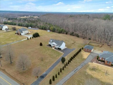 Aerial view of home and property