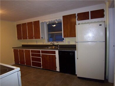 Kitchen. Ceramic tile floor.  Appliances can remai