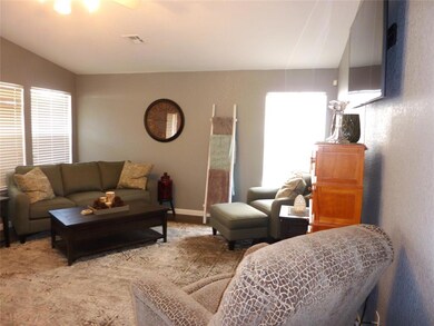 Living room with lofted ceiling