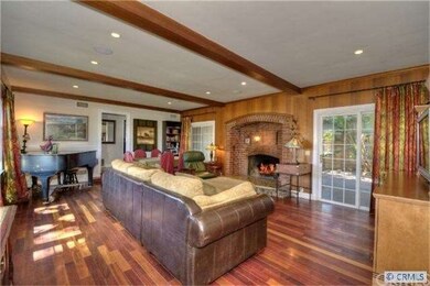 Inviting living room with stunning fireplace and g