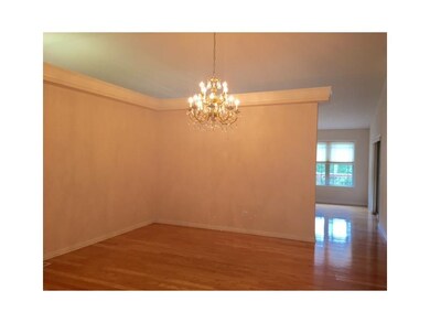 Dining Room. FORMAL DINE AREA GREETS GUESTS W/ HARDWOOD FLOORS/UNIQUE MOLDING/TRIM.